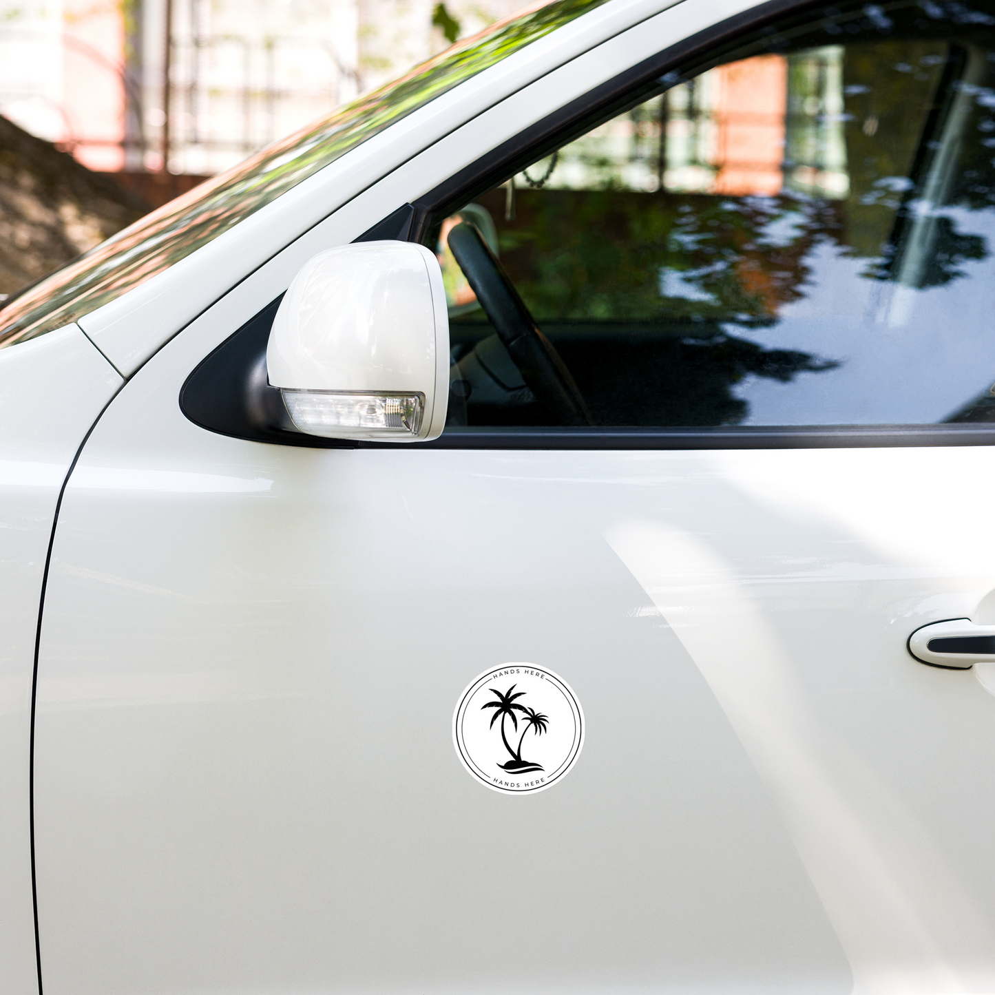 Magnet on door panel of white car